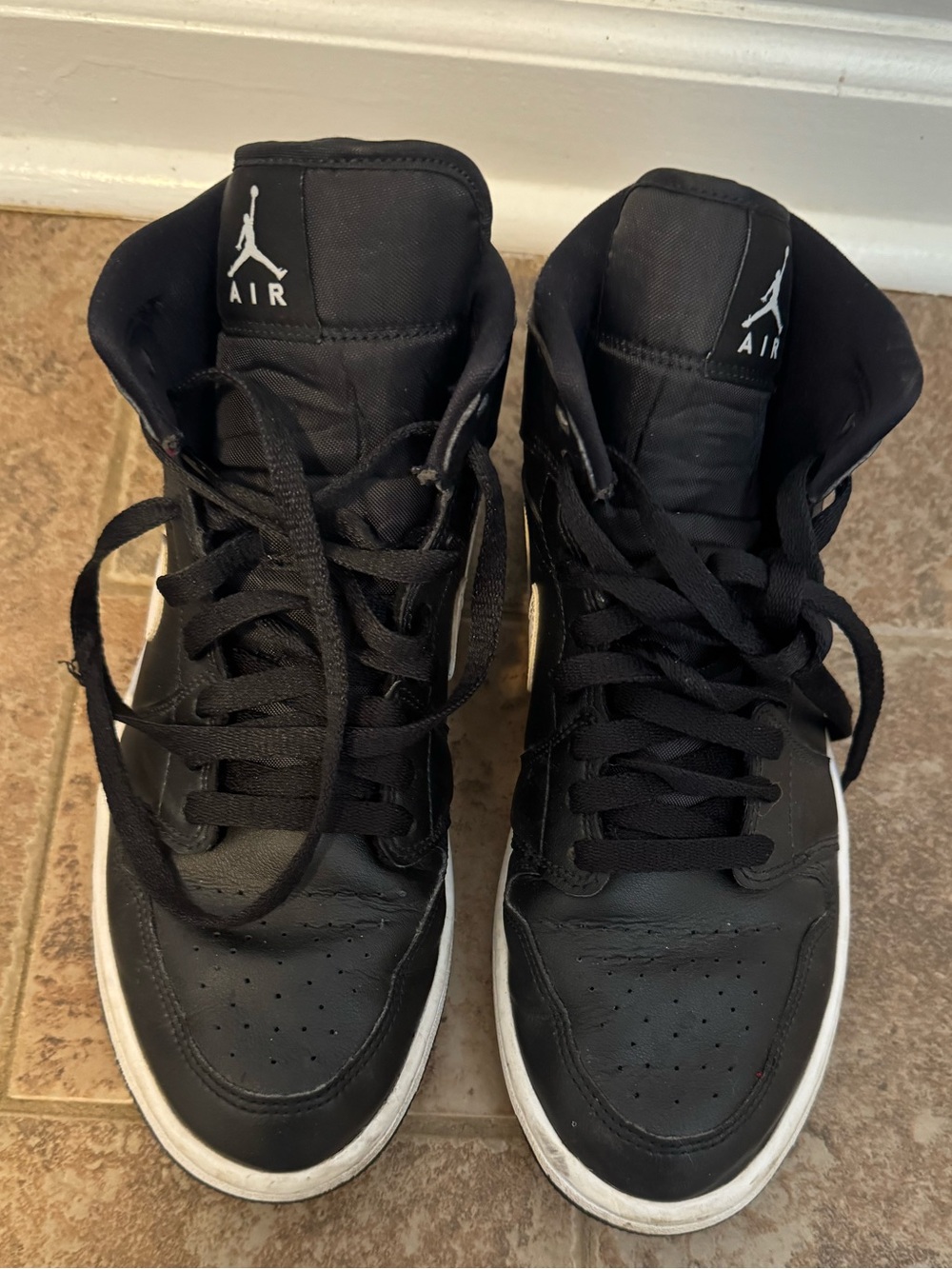 Jordan Black and White High-Top Athletic Sneakers